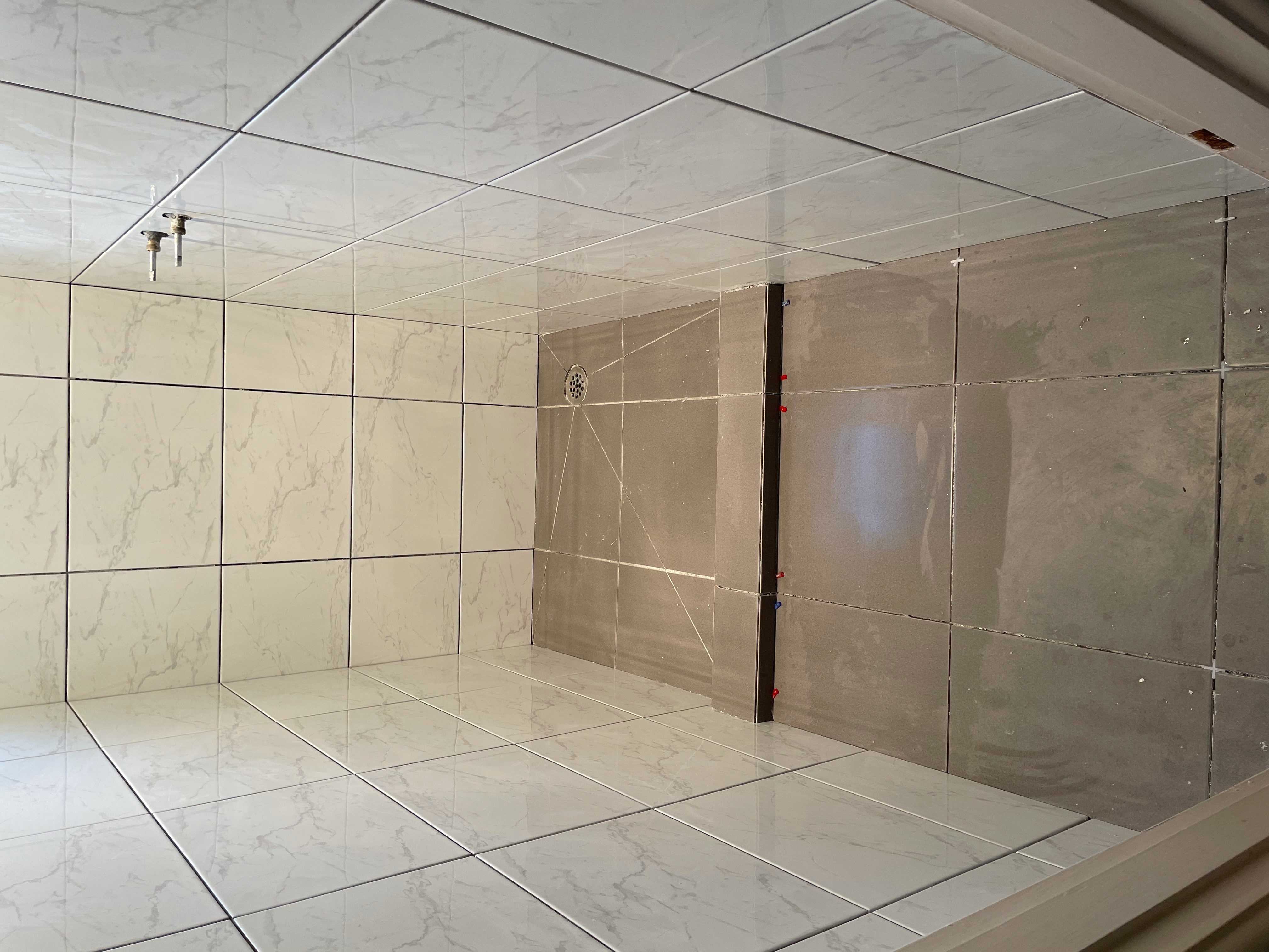 Tiled walls and floor